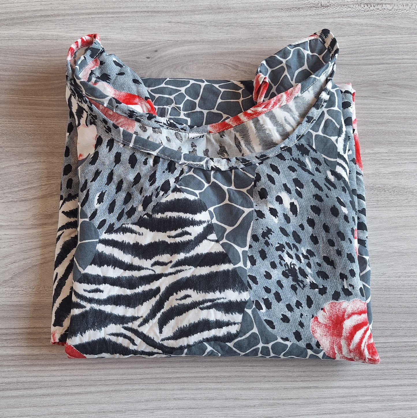 Damen Blusentop Animalprint 46